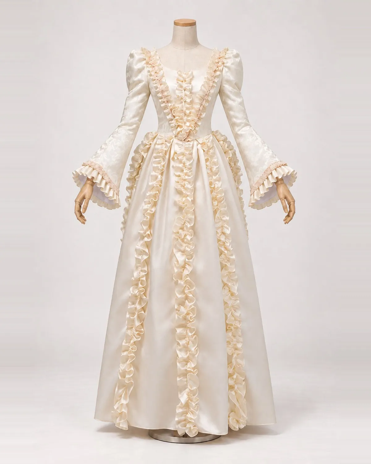 Héloïse Crème — Cream Floral Gown with Vertical Ruffle Trim — shown on a mannequin, front product view