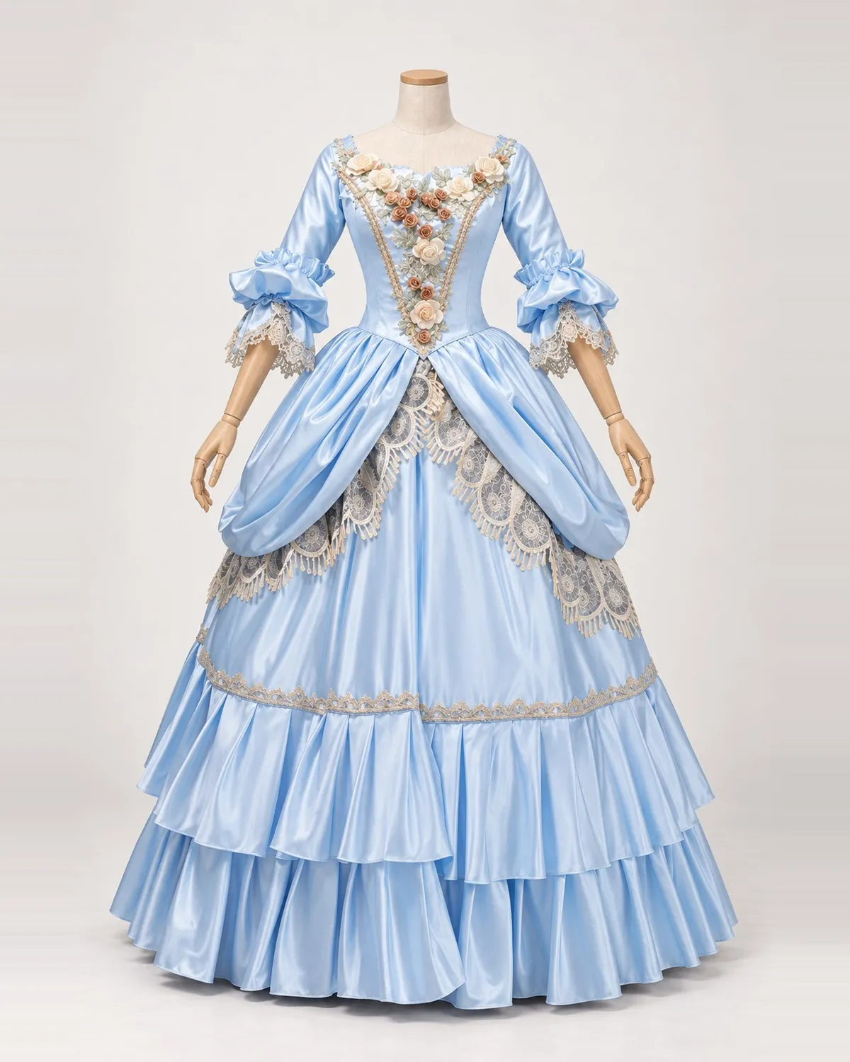 Roseraie Céleste — Sky Blue Satin-Look Gown with Cream Roses and Lace Swags — shown on a mannequin, front product view