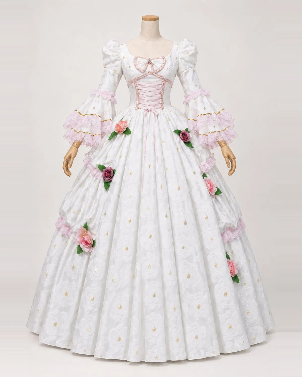 Roseraie Enchantée — White Floral Gown with Pink Lacing and Roses — shown on a mannequin, front product view