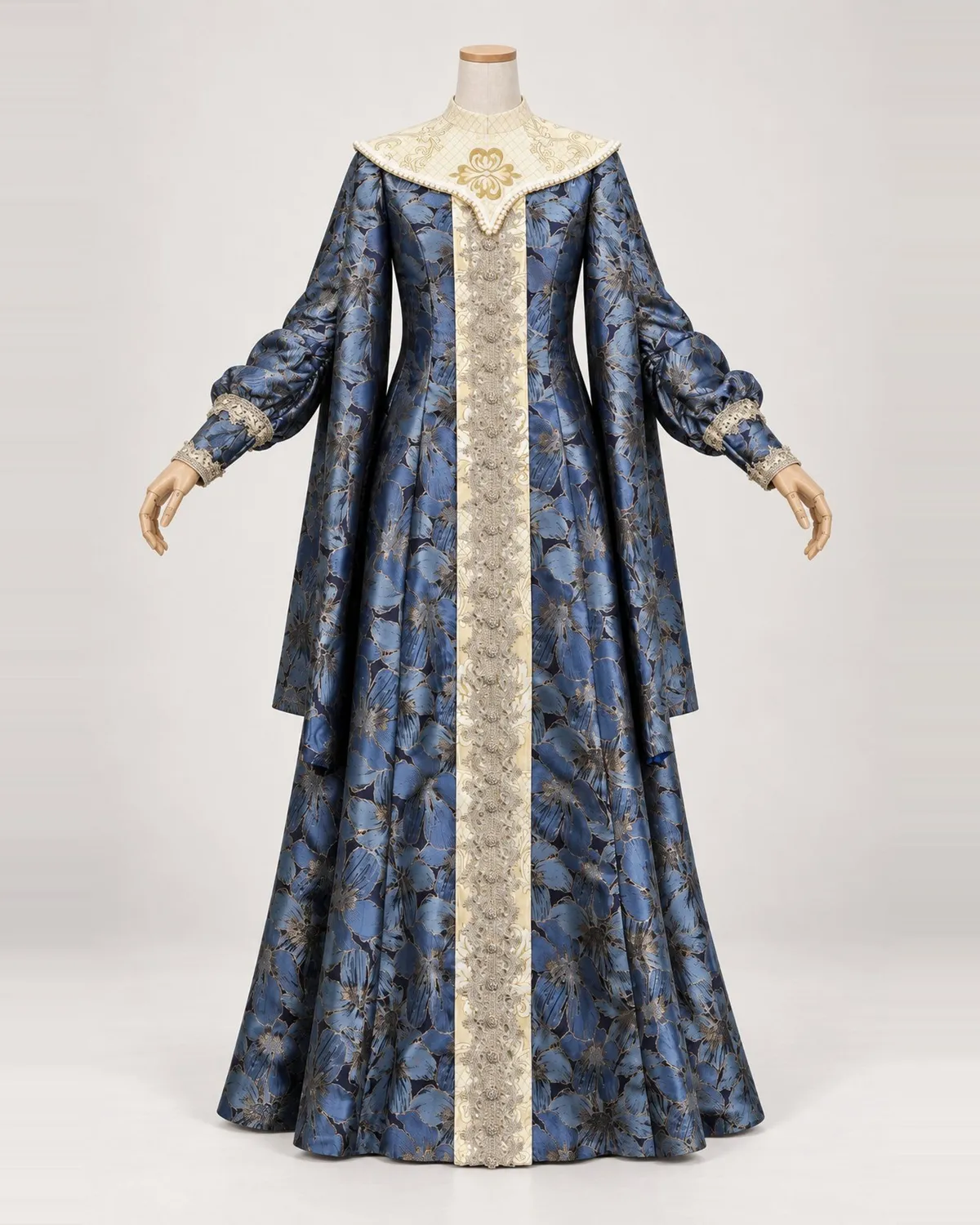 Iris Souverain — Blue Floral Gown with Ivory Pointed Yoke — shown on a mannequin, front product view