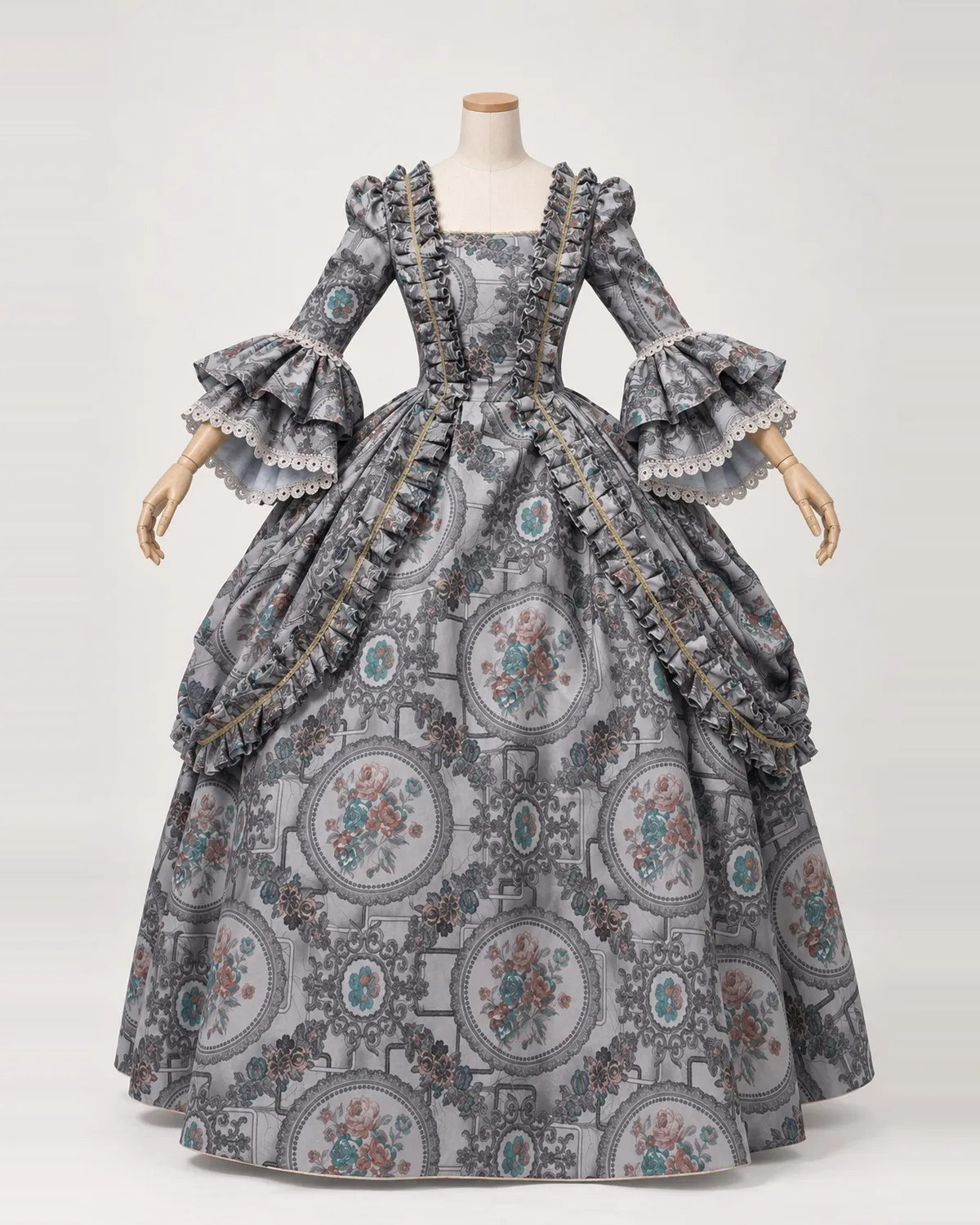 Galerie Brumeuse — Grey Floral Medallion Gown with Draped Side Panels — shown on a mannequin, front product view