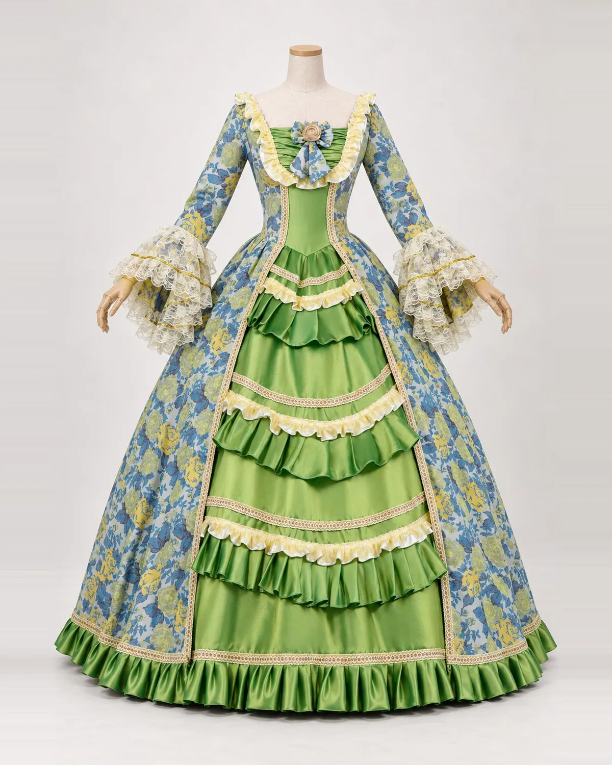Feuillage Cobalt — Blue Floral Gown with Green Satin-Look Tiers — shown on a mannequin, front product view