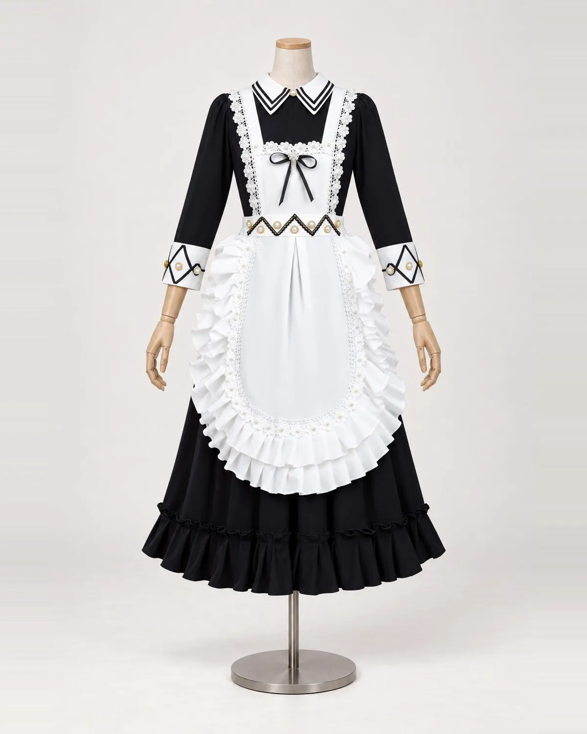 Colette Domino — Black and White Apron-Front Dress with Ruffled Tea-Length Skirt — shown on a mannequin, front product view
