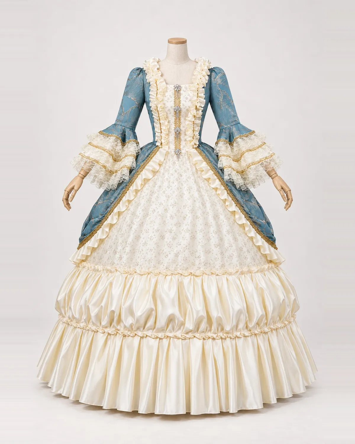 Rivage Paisible — Cream and Dusty Blue Gown with Puffed Skirt Band — shown on a mannequin, front product view