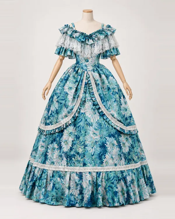 Dahlia Marine — Blue Floral Gown with Off-Shoulder Ruffles and White Lace