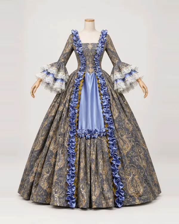 Bérénice Brocart — Blue-Grey and Gold Patterned Gown with Blue Ruffles